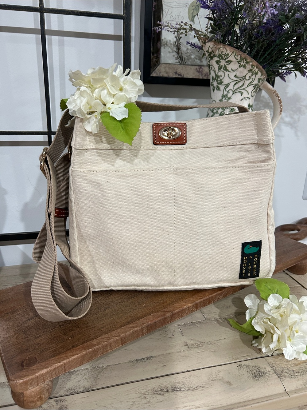 Dooney & Bourke Cream Canvas Messenger Bag with Tan Trim